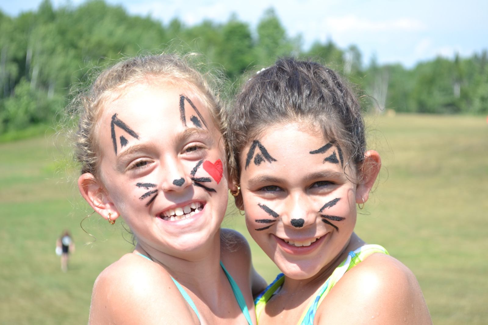 kids smiling with face paint